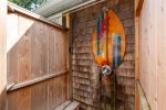 Rinse off the sand in the new outdoor shower